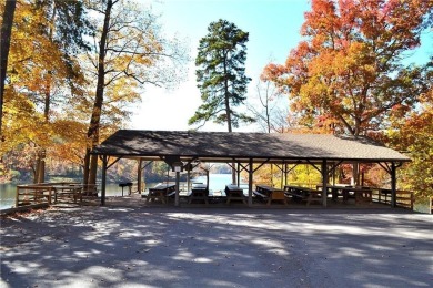 This beautiful, meticulously maintained log home sits on .95 on Bent Tree Golf Course in Georgia - for sale on GolfHomes.com, golf home, golf lot