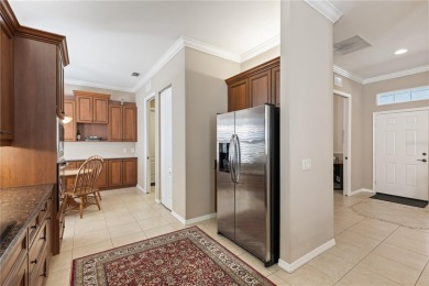 Under contract-accepting backup offers. Maintenance-Free Villa on Plantation Golf and Country Club in Florida - for sale on GolfHomes.com, golf home, golf lot