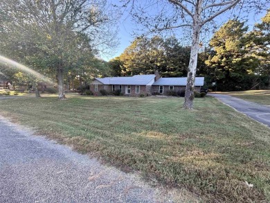 Ready to have the convenience of a golf course right next door? on Bald Knob Country Club in Arkansas - for sale on GolfHomes.com, golf home, golf lot