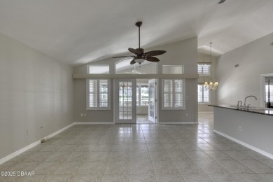 Welcome home to this beautifully maintained 3-bedroom on Plantation Bay Golf and Country Club in Florida - for sale on GolfHomes.com, golf home, golf lot