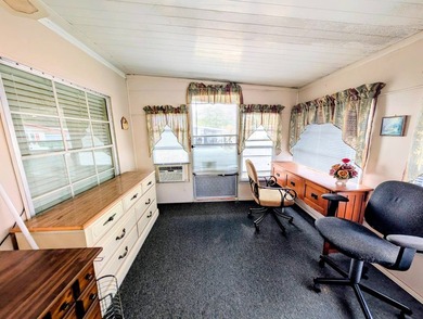 Welcome to easy Florida living in Woodbrook Estates! This on Grasslands Golf and Country Club in Florida - for sale on GolfHomes.com, golf home, golf lot