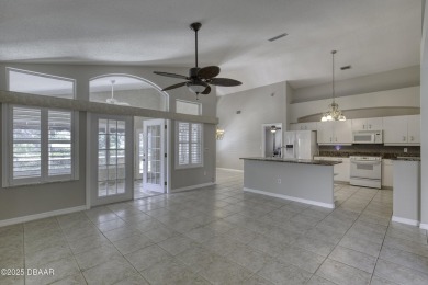 Welcome home to this beautifully maintained 3-bedroom on Plantation Bay Golf and Country Club in Florida - for sale on GolfHomes.com, golf home, golf lot
