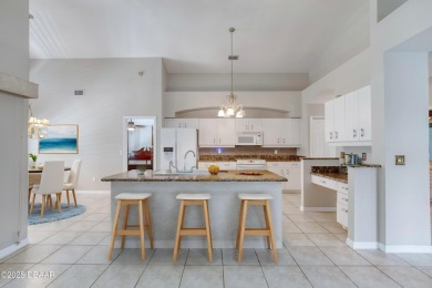 Welcome home to this beautifully maintained 3-bedroom on Plantation Bay Golf and Country Club in Florida - for sale on GolfHomes.com, golf home, golf lot