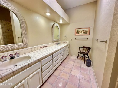 Nestled into a quiet street within the Rio Verde active adult on Rio Verde Country Club - Quail Run in Arizona - for sale on GolfHomes.com, golf home, golf lot