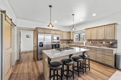 This 3,260 sq ft 4-bedroom, 2.5-bathroom home with a bonus room on McCall Municipal Golf Course in Idaho - for sale on GolfHomes.com, golf home, golf lot