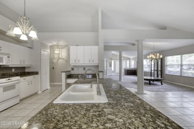 Welcome home to this beautifully maintained 3-bedroom on Plantation Bay Golf and Country Club in Florida - for sale on GolfHomes.com, golf home, golf lot