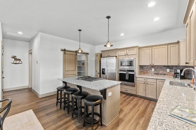 This 3,260 sq ft 4-bedroom, 2.5-bathroom home with a bonus room on McCall Municipal Golf Course in Idaho - for sale on GolfHomes.com, golf home, golf lot