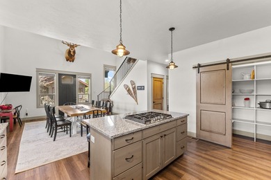 This 3,260 sq ft 4-bedroom, 2.5-bathroom home with a bonus room on McCall Municipal Golf Course in Idaho - for sale on GolfHomes.com, golf home, golf lot