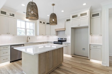 Experience refined coastal living at 387 Blossom Tree Lane SE on Carolina National Golf Club in North Carolina - for sale on GolfHomes.com, golf home, golf lot