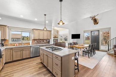 This 3,260 sq ft 4-bedroom, 2.5-bathroom home with a bonus room on McCall Municipal Golf Course in Idaho - for sale on GolfHomes.com, golf home, golf lot