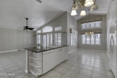 Welcome home to this beautifully maintained 3-bedroom on Plantation Bay Golf and Country Club in Florida - for sale on GolfHomes.com, golf home, golf lot