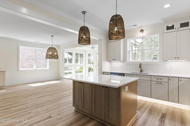 Experience refined coastal living at 387 Blossom Tree Lane SE on Carolina National Golf Club in North Carolina - for sale on GolfHomes.com, golf home, golf lot