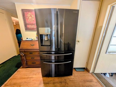 Welcome to easy Florida living in Woodbrook Estates! This on Grasslands Golf and Country Club in Florida - for sale on GolfHomes.com, golf home, golf lot