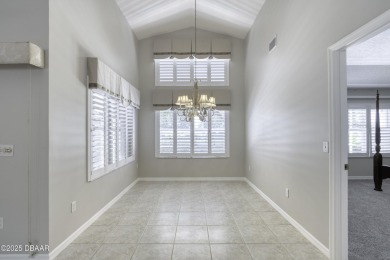 Welcome home to this beautifully maintained 3-bedroom on Plantation Bay Golf and Country Club in Florida - for sale on GolfHomes.com, golf home, golf lot