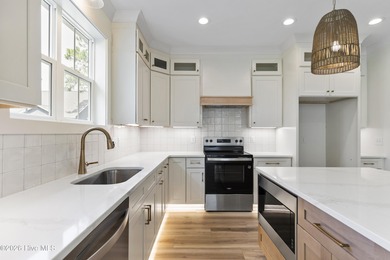 Experience refined coastal living at 387 Blossom Tree Lane SE on Carolina National Golf Club in North Carolina - for sale on GolfHomes.com, golf home, golf lot