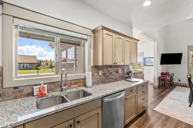 This 3,260 sq ft 4-bedroom, 2.5-bathroom home with a bonus room on McCall Municipal Golf Course in Idaho - for sale on GolfHomes.com, golf home, golf lot