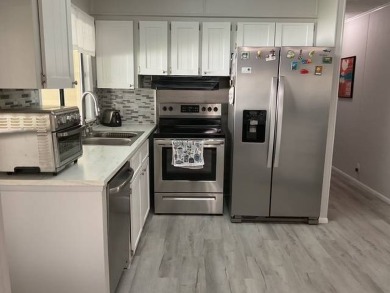 This meticulously maintained 2-bedroom, 2-bathroom home is being on Vista Plantation Golf Club in Florida - for sale on GolfHomes.com, golf home, golf lot