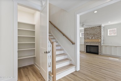 Experience refined coastal living at 387 Blossom Tree Lane SE on Carolina National Golf Club in North Carolina - for sale on GolfHomes.com, golf home, golf lot