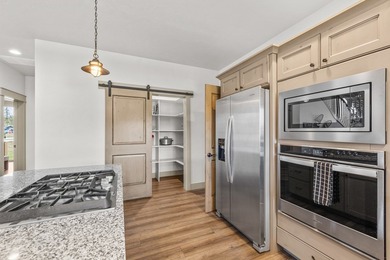 This 3,260 sq ft 4-bedroom, 2.5-bathroom home with a bonus room on McCall Municipal Golf Course in Idaho - for sale on GolfHomes.com, golf home, golf lot