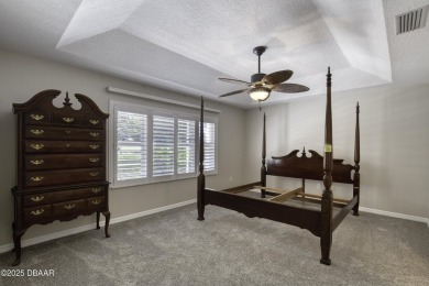 Welcome home to this beautifully maintained 3-bedroom on Plantation Bay Golf and Country Club in Florida - for sale on GolfHomes.com, golf home, golf lot