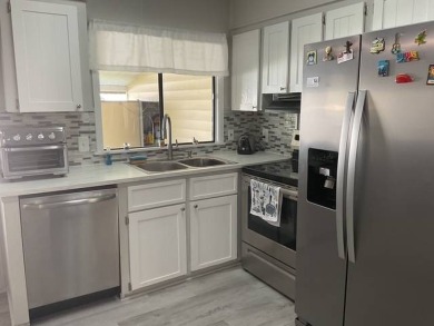 This meticulously maintained 2-bedroom, 2-bathroom home is being on Vista Plantation Golf Club in Florida - for sale on GolfHomes.com, golf home, golf lot