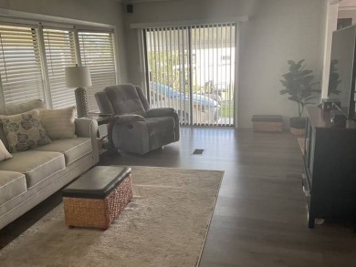 This meticulously maintained 2-bedroom, 2-bathroom home is being on Vista Plantation Golf Club in Florida - for sale on GolfHomes.com, golf home, golf lot