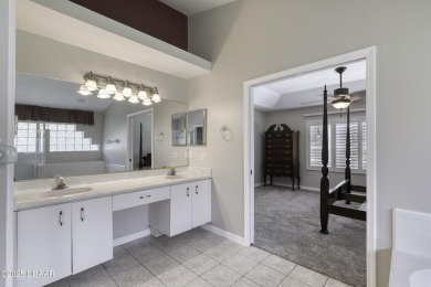 Welcome home to this beautifully maintained 3-bedroom on Plantation Bay Golf and Country Club in Florida - for sale on GolfHomes.com, golf home, golf lot