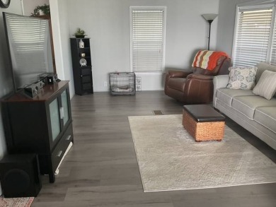 This meticulously maintained 2-bedroom, 2-bathroom home is being on Vista Plantation Golf Club in Florida - for sale on GolfHomes.com, golf home, golf lot
