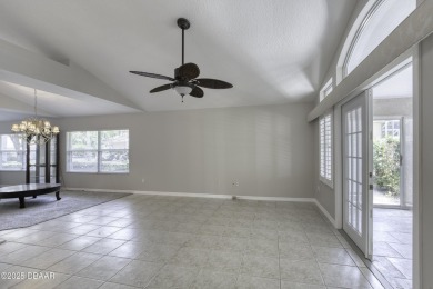 Welcome home to this beautifully maintained 3-bedroom on Plantation Bay Golf and Country Club in Florida - for sale on GolfHomes.com, golf home, golf lot