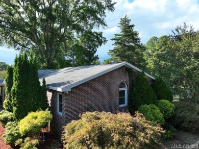 Reasonably priced Lake Gaston home with launch ramp behind the on Myrick Hills Country Club in North Carolina - for sale on GolfHomes.com, golf home, golf lot