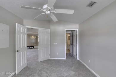 Welcome home to this beautifully maintained 3-bedroom on Plantation Bay Golf and Country Club in Florida - for sale on GolfHomes.com, golf home, golf lot