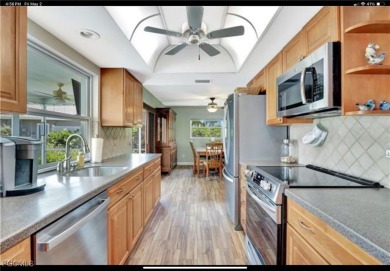 Charming single-family home located at 421 Marathon Ct, Naples on Lakewood Country Club in Florida - for sale on GolfHomes.com, golf home, golf lot