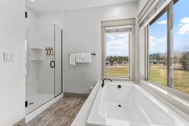 This 3,260 sq ft 4-bedroom, 2.5-bathroom home with a bonus room on McCall Municipal Golf Course in Idaho - for sale on GolfHomes.com, golf home, golf lot