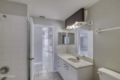 Welcome home to this beautifully maintained 3-bedroom on Plantation Bay Golf and Country Club in Florida - for sale on GolfHomes.com, golf home, golf lot