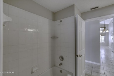 Welcome home to this beautifully maintained 3-bedroom on Plantation Bay Golf and Country Club in Florida - for sale on GolfHomes.com, golf home, golf lot