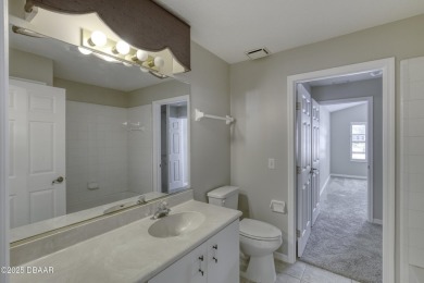Welcome home to this beautifully maintained 3-bedroom on Plantation Bay Golf and Country Club in Florida - for sale on GolfHomes.com, golf home, golf lot