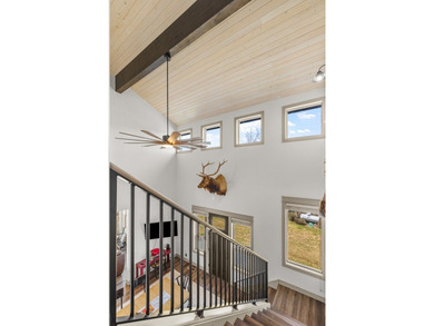 This 3,260 sq ft 4-bedroom, 2.5-bathroom home with a bonus room on McCall Municipal Golf Course in Idaho - for sale on GolfHomes.com, golf home, golf lot