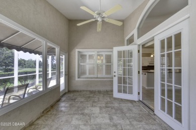 Welcome home to this beautifully maintained 3-bedroom on Plantation Bay Golf and Country Club in Florida - for sale on GolfHomes.com, golf home, golf lot
