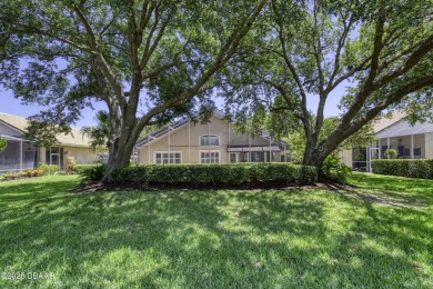 Welcome home to this beautifully maintained 3-bedroom on Plantation Bay Golf and Country Club in Florida - for sale on GolfHomes.com, golf home, golf lot