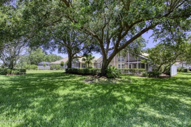 Welcome home to this beautifully maintained 3-bedroom on Plantation Bay Golf and Country Club in Florida - for sale on GolfHomes.com, golf home, golf lot