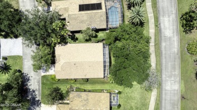 Welcome home to this beautifully maintained 3-bedroom on Plantation Bay Golf and Country Club in Florida - for sale on GolfHomes.com, golf home, golf lot