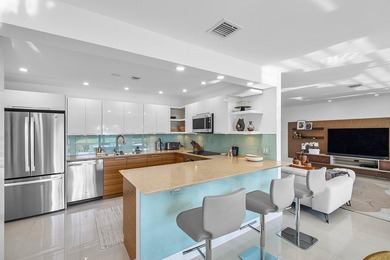 Welcome to this beautifully updated second-floor residence in on Quail Ridge Golf Course and Country Club in Florida - for sale on GolfHomes.com, golf home, golf lot