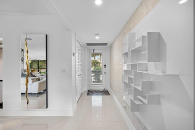 Welcome to this beautifully updated second-floor residence in on Quail Ridge Golf Course and Country Club in Florida - for sale on GolfHomes.com, golf home, golf lot