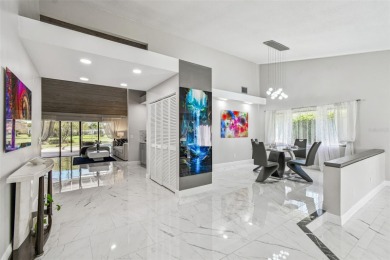 Your DREAM home awaits in the heart of beautiful CARROLLWOOD on Carrollwood Country Club in Florida - for sale on GolfHomes.com, golf home, golf lot