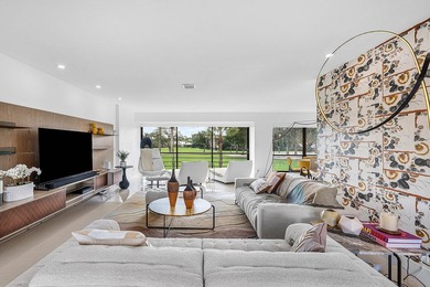 Welcome to this beautifully updated second-floor residence in on Quail Ridge Golf Course and Country Club in Florida - for sale on GolfHomes.com, golf home, golf lot