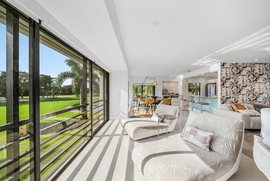 Welcome to this beautifully updated second-floor residence in on Quail Ridge Golf Course and Country Club in Florida - for sale on GolfHomes.com, golf home, golf lot