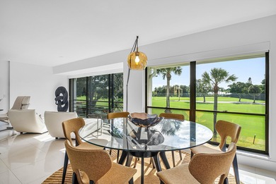 Welcome to this beautifully updated second-floor residence in on Quail Ridge Golf Course and Country Club in Florida - for sale on GolfHomes.com, golf home, golf lot