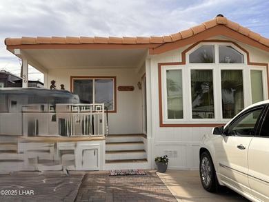 Adorable park model located in the beautiful gated 55+ community on Riverview Golf Course in Arizona - for sale on GolfHomes.com, golf home, golf lot