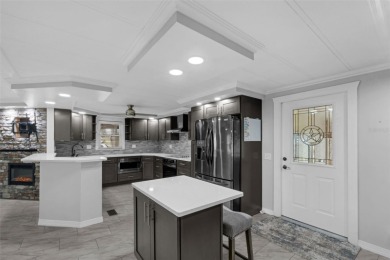 STOP THE CAR, THIS IS THE ONE! Fully Updated Top to Bottom on Cypress Point RV Golf Club in Florida - for sale on GolfHomes.com, golf home, golf lot