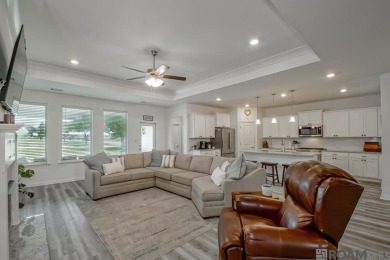 Nestled on the scenic fairways of The Island golf community on The Island Country Club in Louisiana - for sale on GolfHomes.com, golf home, golf lot